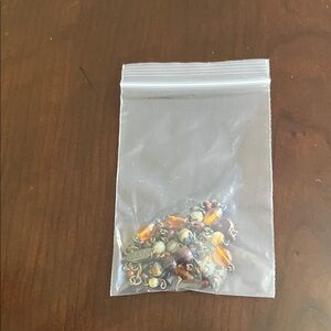 Stylish Mixed Metal and Orange Phone Charms